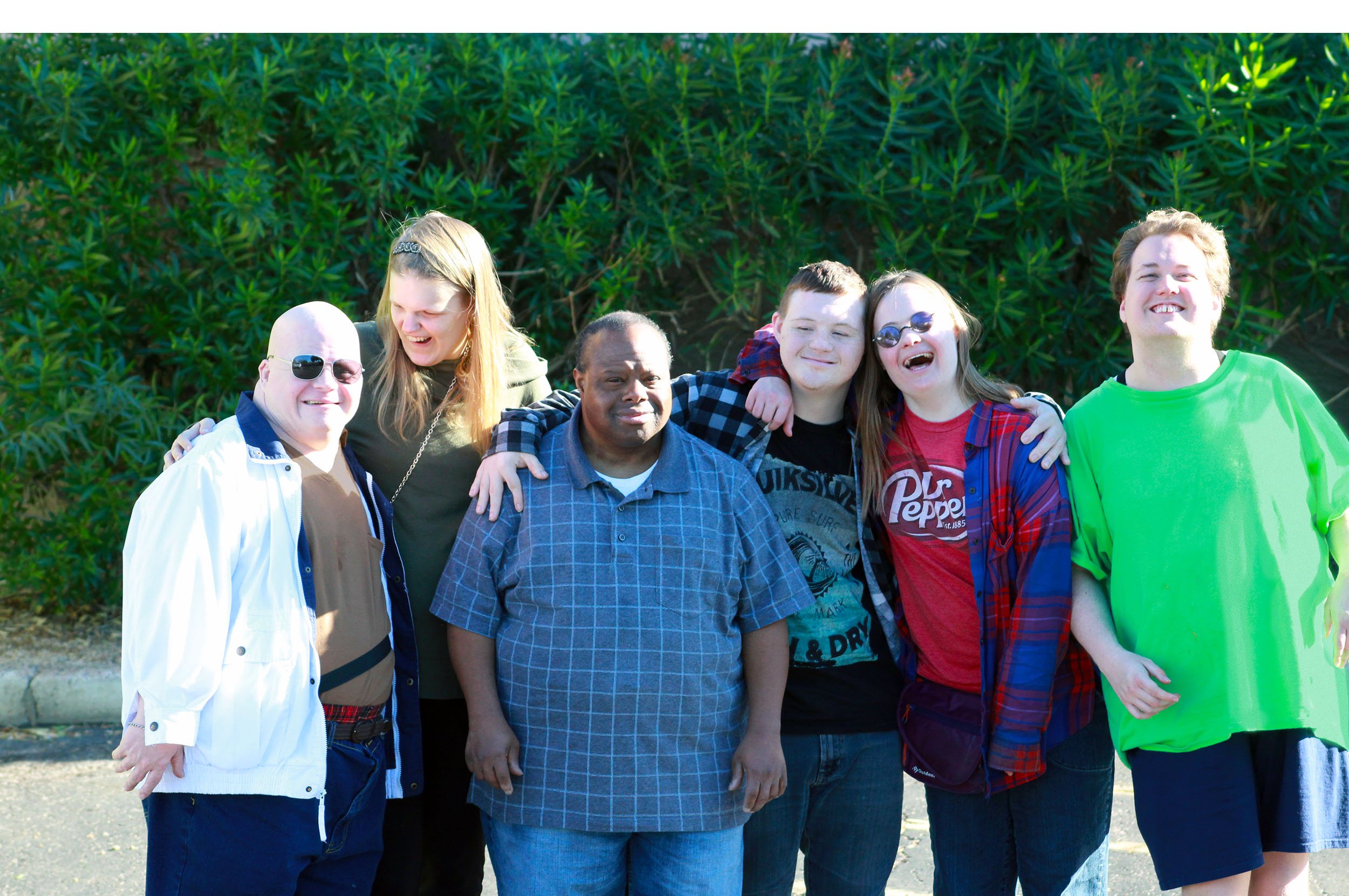 A group of Citivan guests smiling